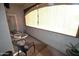 Balcony view, featuring seating and shade at 5345 E Van Buren St # 115, Phoenix, AZ 85008