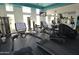 Well-equipped fitness center with modern treadmills and exercise equipment for a convenient and healthy lifestyle at 5345 E Van Buren St # 115, Phoenix, AZ 85008
