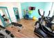 Bright fitness center with free weights, machines, and mirrored walls, offering a variety of exercise options at 5345 E Van Buren St # 115, Phoenix, AZ 85008