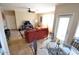 Comfortable living area with dining table, balcony access and modern furniture at 5345 E Van Buren St # 115, Phoenix, AZ 85008