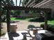 Shaded outdoor picnic area with a volleyball court, perfect for community gatherings and outdoor recreation at 5345 E Van Buren St # 115, Phoenix, AZ 85008