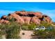 Iconic red rock buttes of Papago Park with hiking trails, scenic views, and desert vegetation under a bright blue sky at 5345 E Van Buren St # 115, Phoenix, AZ 85008