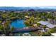 Aerial shot of Phoenix Zoo featuring pathways, lush greenery, a scenic pond, and animal habitats for a Gathering adventure at 5345 E Van Buren St # 115, Phoenix, AZ 85008