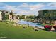 Beautiful community water feature with lush landscaping and fountains, creating a tranquil oasis for residents at 5345 E Van Buren St # 115, Phoenix, AZ 85008