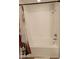 Bathroom featuring shower and tub at 5345 E Van Buren St # 116, Phoenix, AZ 85008