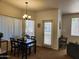 Dining room with carpet and natural light at 5345 E Van Buren St # 116, Phoenix, AZ 85008