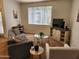 Living room featuring updated furnishings and finishes at 5345 E Van Buren St # 116, Phoenix, AZ 85008