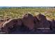 Scenic aerial view of Papago Park featuring iconic rock formations and hiking trails at 5345 E Van Buren St # 116, Phoenix, AZ 85008