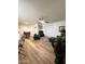 Open-concept living room with a dining area, modern furnishings, and ample natural light at 5345 E Van Buren St # 216, Phoenix, AZ 85008