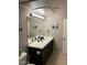 Bathroom featuring a vanity with solid surface countertop, undermount sink, and modern fixtures at 5345 E Van Buren St # 370, Phoenix, AZ 85008