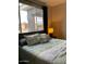 Comfortable bedroom with large windows offering panoramic views at 5345 E Van Buren St # 370, Phoenix, AZ 85008