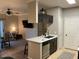 Modern kitchen featuring sleek appliances and an island with bar seating at 5345 E Van Buren St # 370, Phoenix, AZ 85008