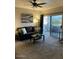 Cozy living room with comfortable seating and sliding door access to a balcony at 5345 E Van Buren St # 370, Phoenix, AZ 85008
