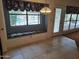 Cozy breakfast nook with a window seat overlooking the outdoor pool at 7420 W Morrow Dr, Glendale, AZ 85308