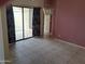 Dining area with tiled floors and sliding glass door at 7420 W Morrow Dr, Glendale, AZ 85308