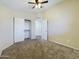 Bedroom featuring neutral carpet and standard closet for storage at 8022 S 48Th Dr Dr, Laveen, AZ 85339