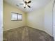 Bedroom with neutral carpet, window and standard closet at 8022 S 48Th Dr Dr, Laveen, AZ 85339