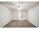 Spacious carpeted bedroom with standard closet for plenty of storage at 836 N Sinova Ave, Gilbert, AZ 85234