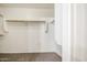 Walk-in closet with built-in shelving offering ample storage space at 836 N Sinova Ave, Gilbert, AZ 85234
