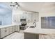 Bright kitchen featuring new countertops, stainless steel appliances, and modern cabinets at 836 N Sinova Ave, Gilbert, AZ 85234