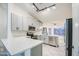 Modern kitchen featuring sleek countertops, stainless steel appliances, and ample cabinet space at 836 N Sinova Ave, Gilbert, AZ 85234