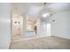 Bright living room showcasing the kitchen and dining area, ideal for entertaining at 836 N Sinova Ave, Gilbert, AZ 85234