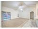 Large living room with sliding glass doors offers a great view of the backyard at 836 N Sinova Ave, Gilbert, AZ 85234