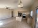 Bright kitchen featuring neutral cabinetry, black appliances, and lots of natural light at 8738 W Griswold Rd, Peoria, AZ 85345
