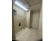 Laundry room with tile flooring, shelving, and washer/dryer hookups at 8738 W Griswold Rd, Peoria, AZ 85345