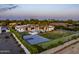 Stylish home boasts a pool, putting green, and sport court for outdoor recreation at 9148 N 66Th Pl, Paradise Valley, AZ 85253
