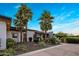 Stylish single-story home featuring desert landscaping and a modern architectural design under a blue sky at 9148 N 66Th Pl, Paradise Valley, AZ 85253