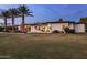 This home features an expansive yard with pool and outdoor living area, perfect for entertaining at 9148 N 66Th Pl, Paradise Valley, AZ 85253