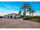 Modern home with three-car garage, sleek design, and well-maintained landscaping offering great curb appeal at 9148 N 66Th Pl, Paradise Valley, AZ 85253