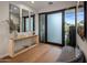 Inviting foyer featuring modern decor, a stylish console table, and a clear view to the outdoors at 9148 N 66Th Pl, Paradise Valley, AZ 85253