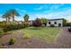 Well maintained front yard features beautiful shrubs and mature trees at 9148 N 66Th Pl, Paradise Valley, AZ 85253