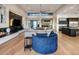 Bright, open living room featuring hardwood floors and modern design elements, creating a welcoming space at 9148 N 66Th Pl, Paradise Valley, AZ 85253