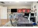Contemporary office space with display case, large monitors, a modern desk, and comfortable seating at 9148 N 66Th Pl, Paradise Valley, AZ 85253