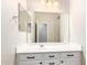 Bathroom featuring single vanity with white cabinets at 9738 E Tumeric Ave, Mesa, AZ 85212