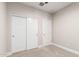 This is a bedroom with a neutral carpet and a closet with sliding doors at 9738 E Tumeric Ave, Mesa, AZ 85212
