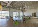 Bright event space with large windows, round tables, and colorful chairs at 9738 E Tumeric Ave, Mesa, AZ 85212