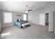 Large main bedroom featuring high ceilings, lots of natural light and neutral color tones at 981 N Quail Ln, Gilbert, AZ 85233
