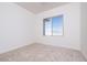 Bedroom with neutral carpet and a window view at 10013 S 36Th Ave, Laveen, AZ 85339