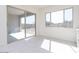 Bright dining area with large sliding glass doors providing backyard access and a view of the surrounding landscape at 10013 S 36Th Ave, Laveen, AZ 85339