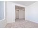 Hallway features neutral walls, carpeting, and recessed lighting at 10013 S 36Th Ave, Laveen, AZ 85339