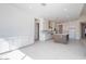 Bright open-concept kitchen features an island, stainless steel appliances, and ample cabinet space at 10013 S 36Th Ave, Laveen, AZ 85339