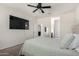 Comfortable bedroom with neutral walls, carpeted floors, and ceiling fan at 1254 E Thomas Dr, Casa Grande, AZ 85122