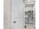 Convenient laundry room featuring modern appliances and shelving for storage at 1254 E Thomas Dr, Casa Grande, AZ 85122