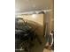 Organized garage featuring storage cabinets and various recreational vehicles and equipment at 14938 W Mauna Loa Ln, Surprise, AZ 85379