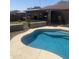 Private backyard pool with patio, ideal for outdoor leisure and entertaining Gathering and friends at 14938 W Mauna Loa Ln, Surprise, AZ 85379