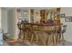 Entertaining bar area features wooden stools, unique decor, and ample space at 1559 S Padre Rd, Apache Junction, AZ 85119